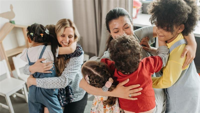 Parents and kids hugging each other
