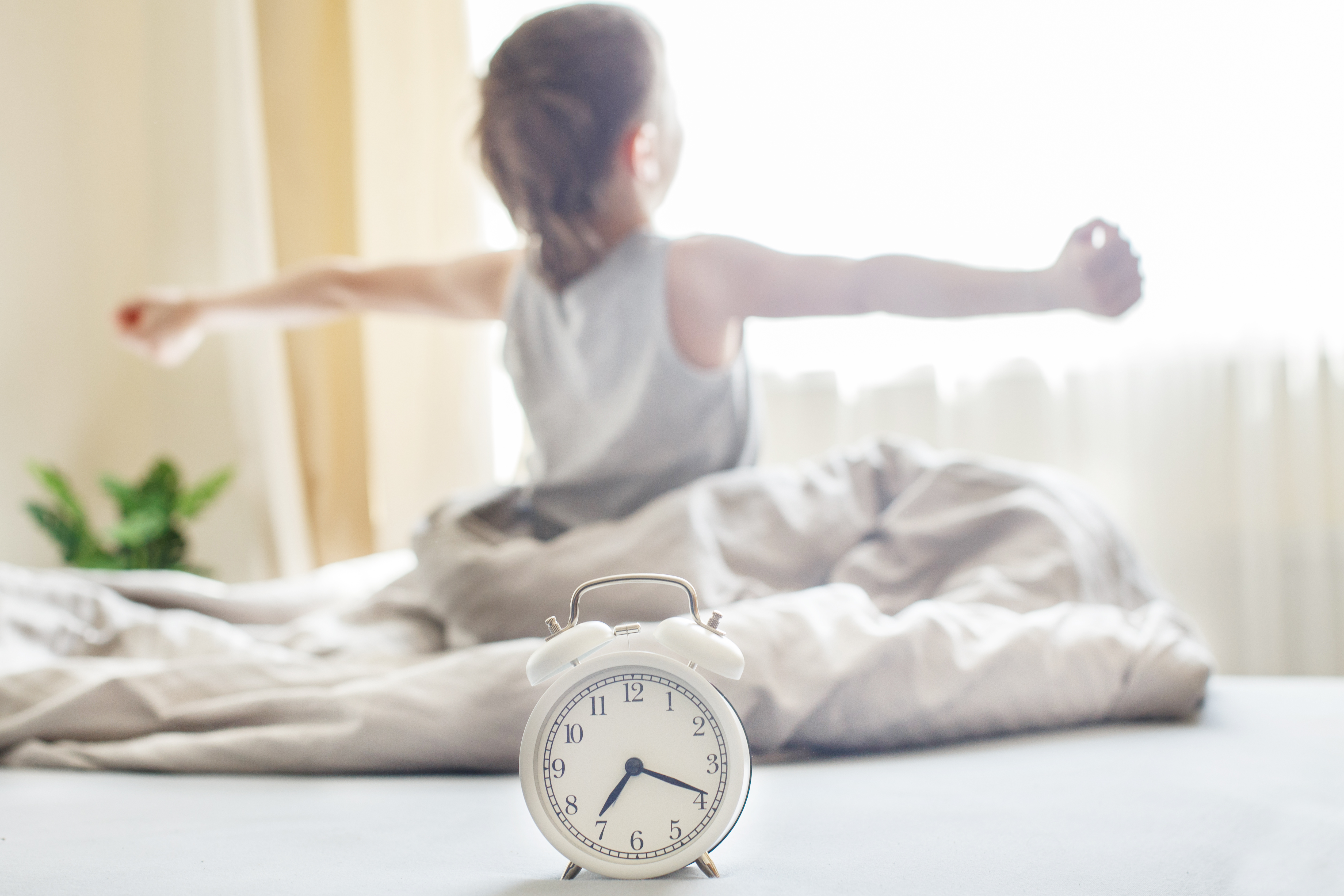 child stretching, getting out of bed